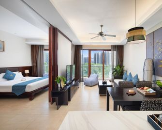 Wanning Rapeseed Flower Seaview Homestay (Shenzhou Peninsula Branch) - Wanning - Bedroom