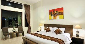 Ganga Hotel & Apartment - Denpasar - Habitación