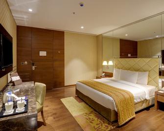 فندق نيرانتا ترانسيت تيرمينال 2 أرايفالز/ لاندسايد - مومباي - غرفة نوم