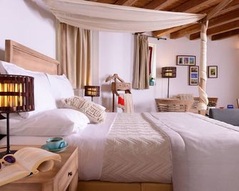 Varos Village Boutique Hotel - Város - Habitación