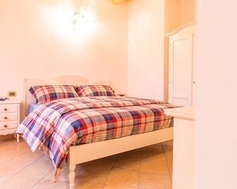 Cortecoraman - Sommacampagna - Schlafzimmer