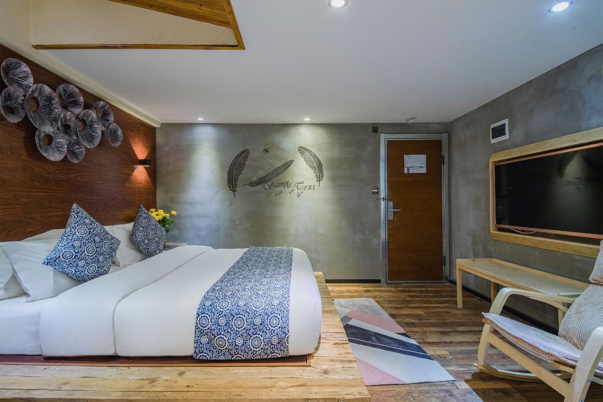 Weiximan Holiday Hotel - קונמינג - חדר שינה