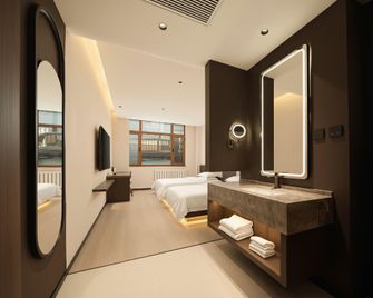 Dalian Xinghai Golf Hotel - Dalian - Bedroom