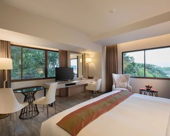 The Heritage Chiang Rai Hotel and Convention - Chiang Rai - Schlafzimmer