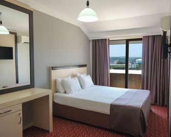Azak Blue Otel - Okurcalar - Habitación