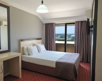 Azak Blue Otel - אוקורצ'אלאר - חדר שינה