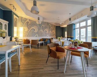 هوتل آند سبا ترزي ويس باي - سوينوجسس - مطعم