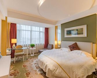 Junhe International Hotel - Bengbu - Спальня