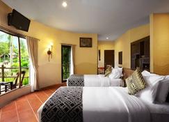 Mara River Safari Lodge - Gianyar - Bedroom