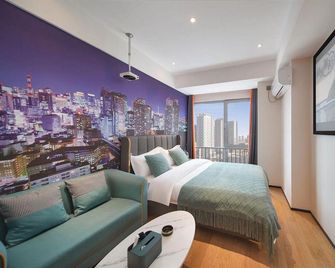 Zhiyue Apartment (Nanjing South Railway Station Vanke Duhuiworld Branch) - Nanjing - Bedroom