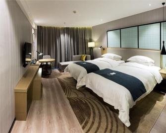 Echarm Hotel Nanchang Hongcheng Big Market - Nanchang - Bedroom