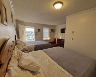 Sandcastle Beachfront Inn - Westerly - Schlafzimmer