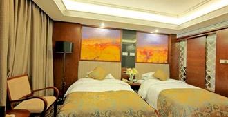 Taoranju Hotel - Linyi - Habitación