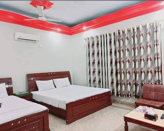 Cosy Inn Millennium - Karachi - Bedroom