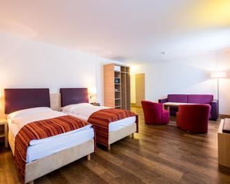 Hotel Coop Tagungszentrum & Hotelpark im Grünen - Basilea - Camera da letto