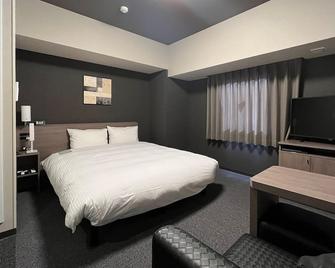 Hotel Route-Inn Nagahama Inter - Nagahama - Bedroom