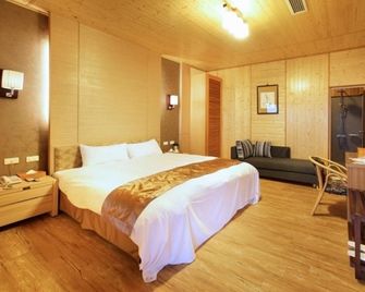 Dragon Manor Resort - רן-איי - חדר שינה