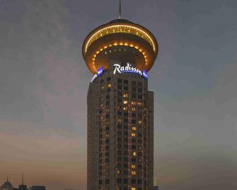 Radisson Blu Hotel Shanghai New World - Xangai - Vista externa