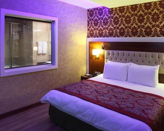 Hotel Senbayrak City - אדנה - חדר שינה