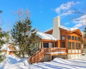 Disciples Village beautiful Condo - Steps to ski and lakes - Boyne Falls - Building