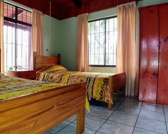 Explore Paradise-Palma Real cottage - Liberia - Habitación