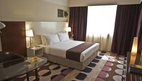 Kingsgate Hotel Abu Dhabi - Abu Dhabi - Schlafzimmer