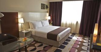 Kingsgate Hotel Abu Dhabi - אבו דאבי - חדר שינה