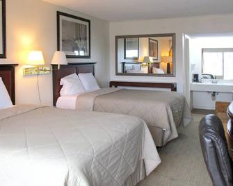 American Inn and Suites - Jasper - Bedroom