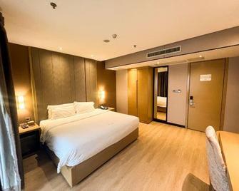 Lavande Hotel Jiangmen Yingbin Avenue Branch - Jiangmen - Slaapkamer