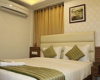 Hotel Vivan - Gandhinagar - Ložnice