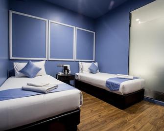 Bloommaze Boutique Hotel Puchong - Puchong - Yatak Odası