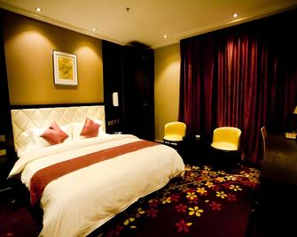 Thank Inn Chain Hotel Shanxi Lvliang Lis - Lüliang - Bedroom