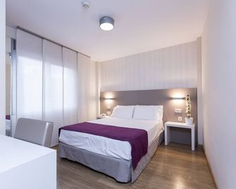 Di' Carlo - מדריד - חדר שינה