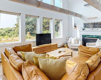 Sun-filled escape with hot tub, deck, bikes, grill, W/D, & central AC - Truro - Living room