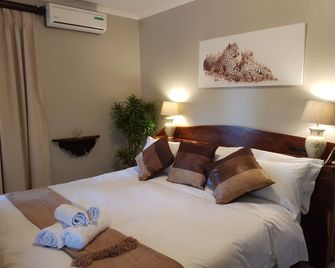 Benka Lifestyle Country Cottages - Lobamba - Camera da letto