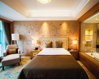 Binjiang International Hotel - Zaozhuang - Bedroom