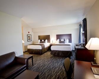 Cobblestone Inn & Suites - Denison | Oak Ridge - Denison - Bedroom
