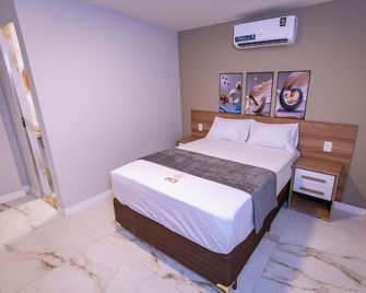 M3 Studio Hotel e Negocios - Camacari - Camera da letto