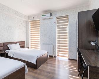 Orion Hotel Tashkent - Taškent - Ložnice