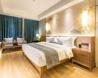 Lijing Hotel (Deyang Chengnan Branch) - Deyang - Slaapkamer