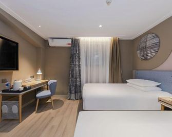 Home Inn Neo Hangzhou West Lake Lakeside Intime Jiefang Road - هانغزهو - غرفة نوم