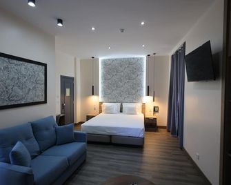 Pensao Praca Da Figueira - ליסבון - חדר שינה