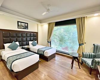 ذا جراند أوريون - كيلاش كولوني - نيو دلهي - غرفة نوم