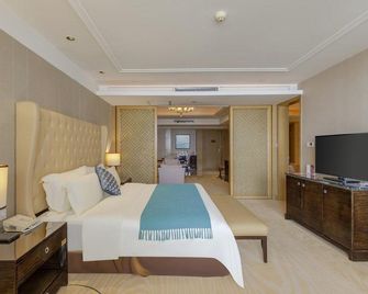 Landbridge Jinjiang Hotel - Rizhao - Slaapkamer