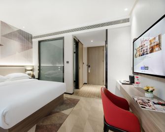 Borrman Hotel Xi'an Port Area Olympic Sports Center - Xi'an - Schlafzimmer