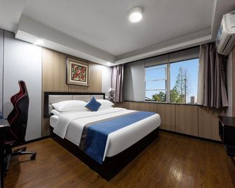 Weidu International Youth Hotel - Wuhan - Habitación