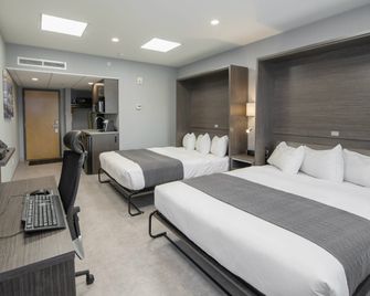Hôtel & Suites Le Dauphin Québec - Quebec - Camera da letto