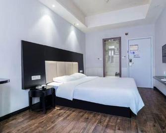 Tianyi Boutique Hotel (Jingzhou Lianghu Market) - Jingzhou - Schlafzimmer