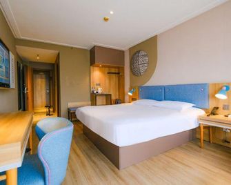 Home Inn Neo - Yangzhou Yizheng Zhenzhou West Road - Yangzhou - Habitación