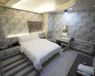 هييو هوتل - هسينشو - غرفة نوم